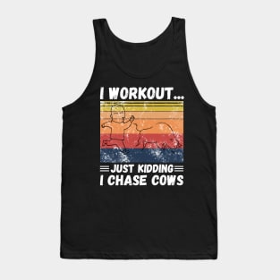 I workout... just kidding I chase cows Tank Top